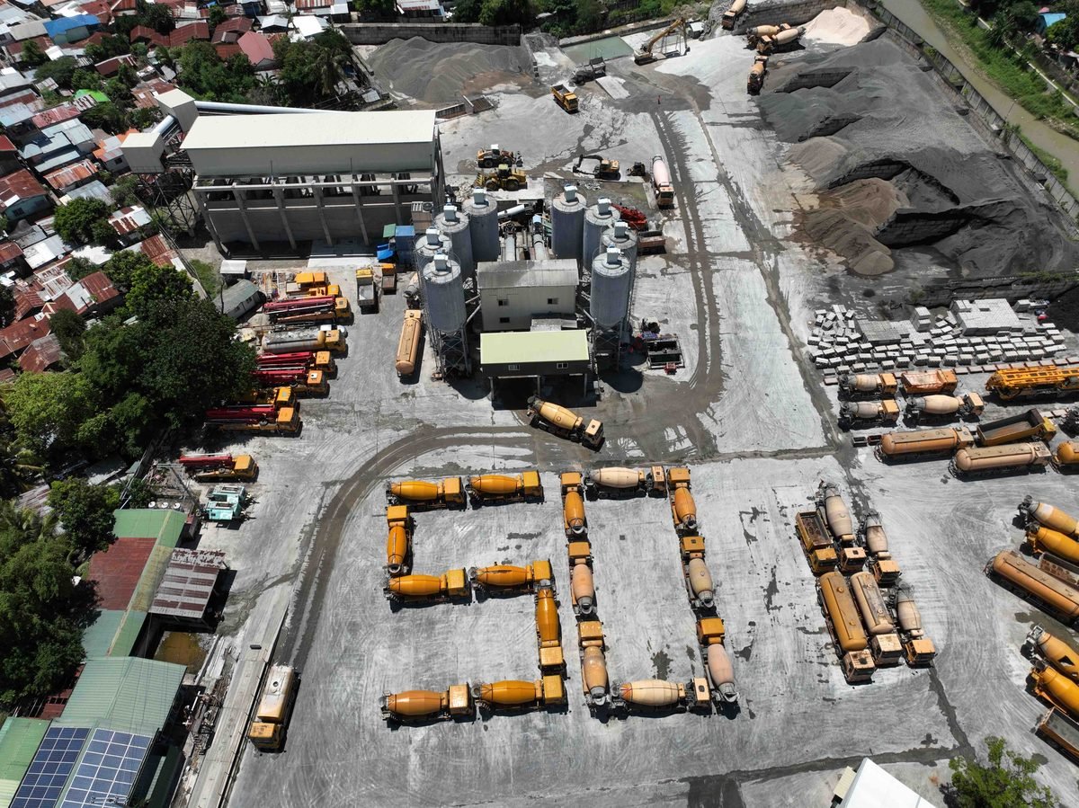Geo-Transport mixer trucks arranged in the plant yard to mark the company's 50th anniversary