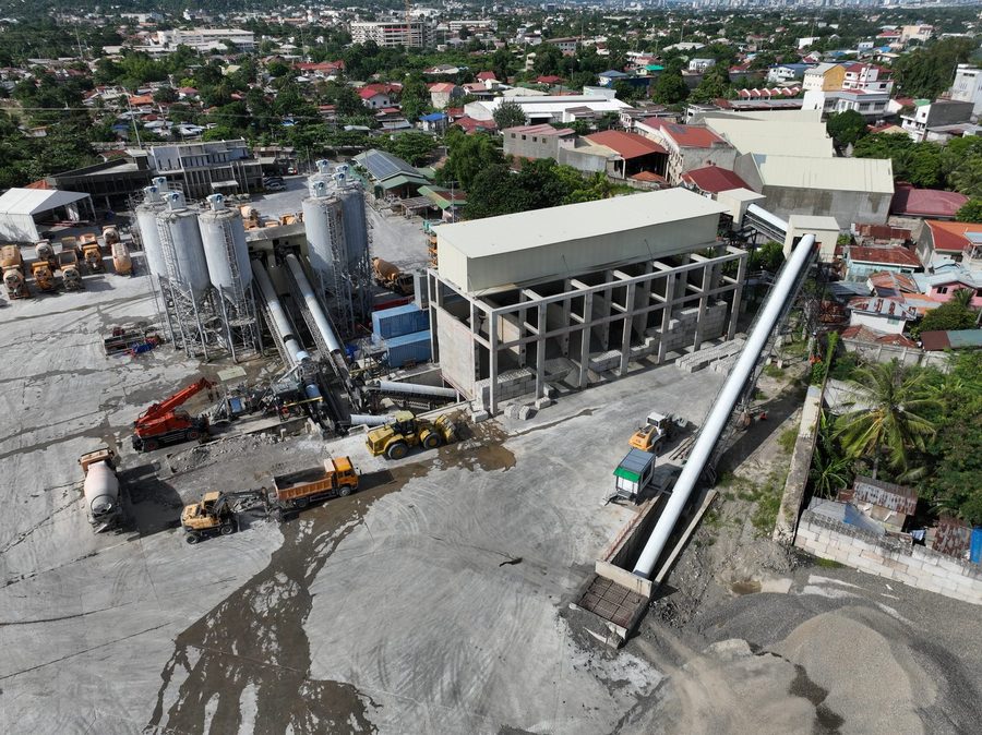 Conveyors and loaders working the Talisay plant